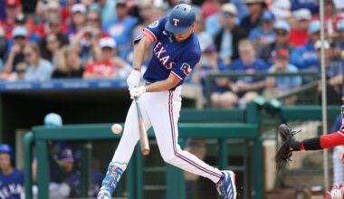 Evan Carter jams hand after making great diving catch for Rangers
