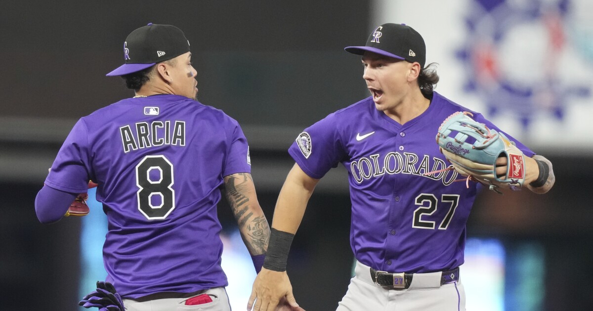 Rockies beat Marlins 3-2, securing a sweep in 1st series win of the season