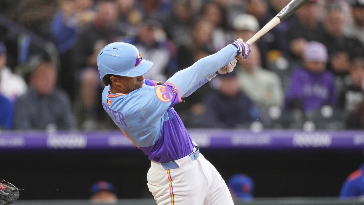 Rockies bring up prospect Ryan Ritter, lines triple in major league debut with family in the stands