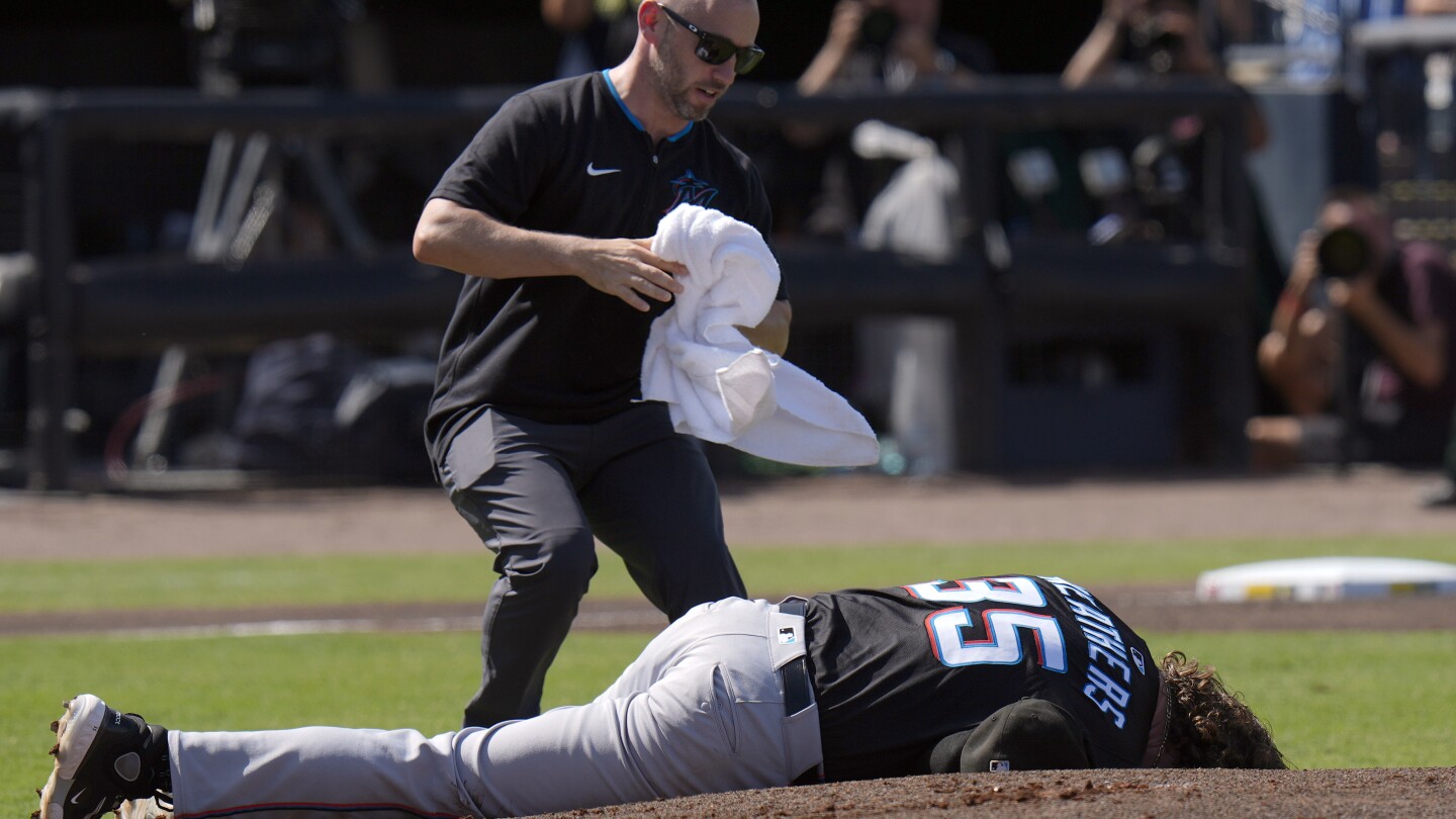 Marlins starter Ryan Weathers hit in head by catcher's throw