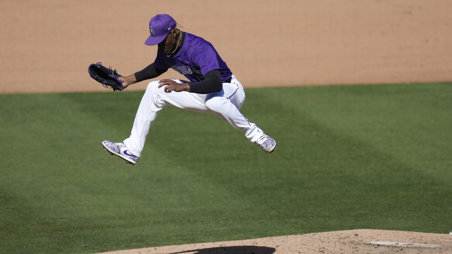 From roofing to a spring training sensation, Rockies' Jefry Yan delights with mound celebrations