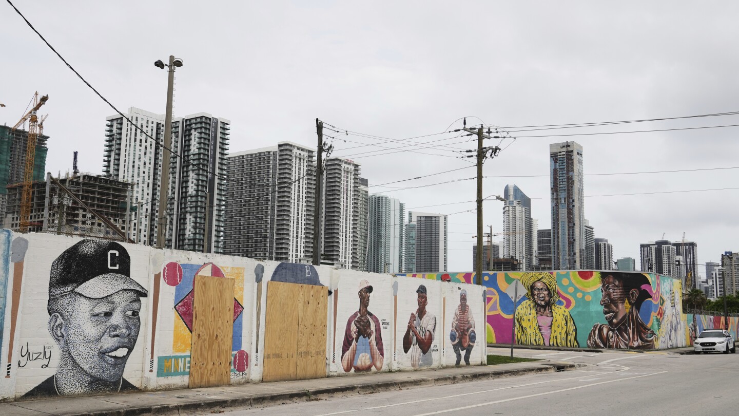 Miami Marlins join efforts to restore defaced Jackie Robinson and Minnie Miñoso mural