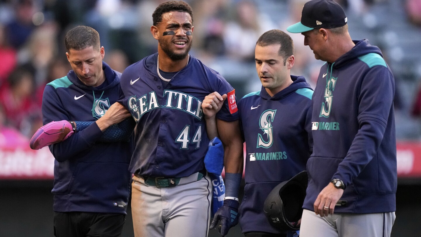 Mariners star Julio Rodríguez appears OK after being knocked out of an 8-6 loss to Angels