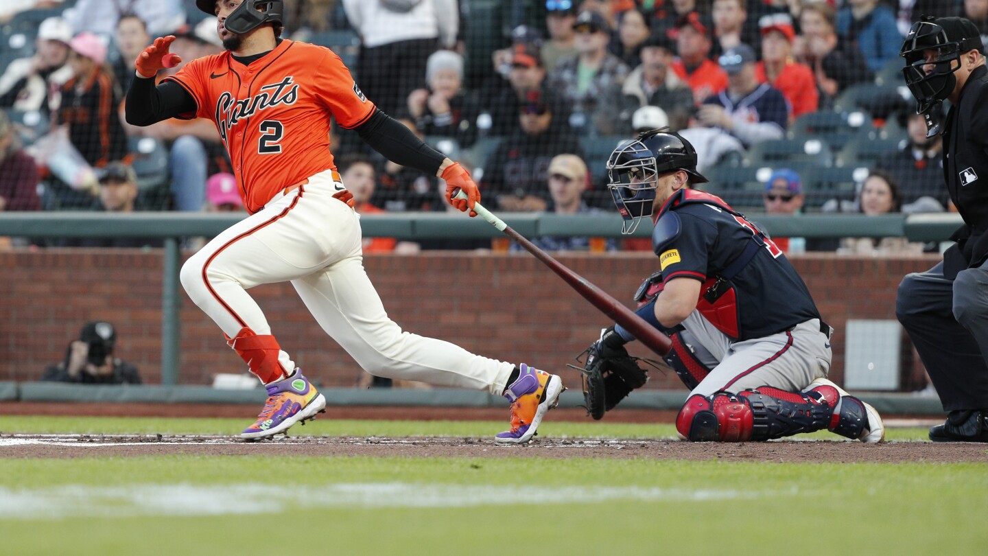 Giants beat the slumping Braves 5-4 in 10 innings on a wild pitch