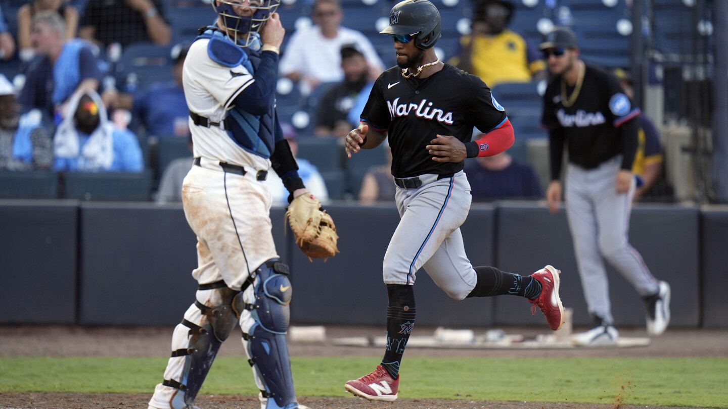 Hernandez gets go-ahead hit in 10th as Marlins outlast Morel, Rays 11-10