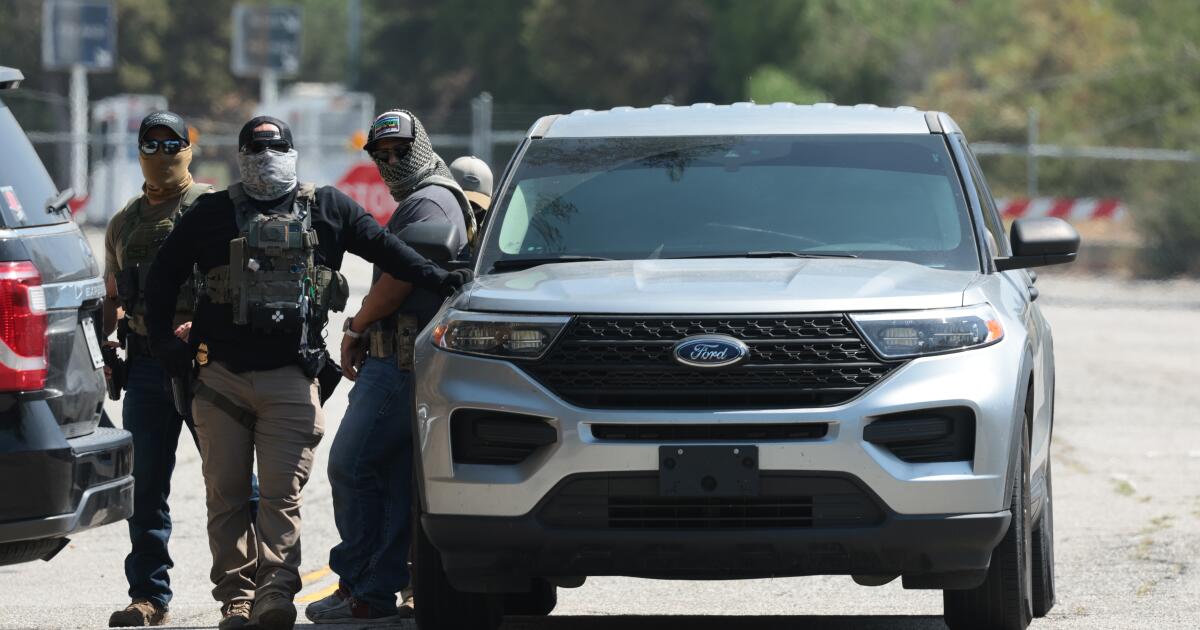 Federal agents denied entry to Dodger Stadium parking lot, team says