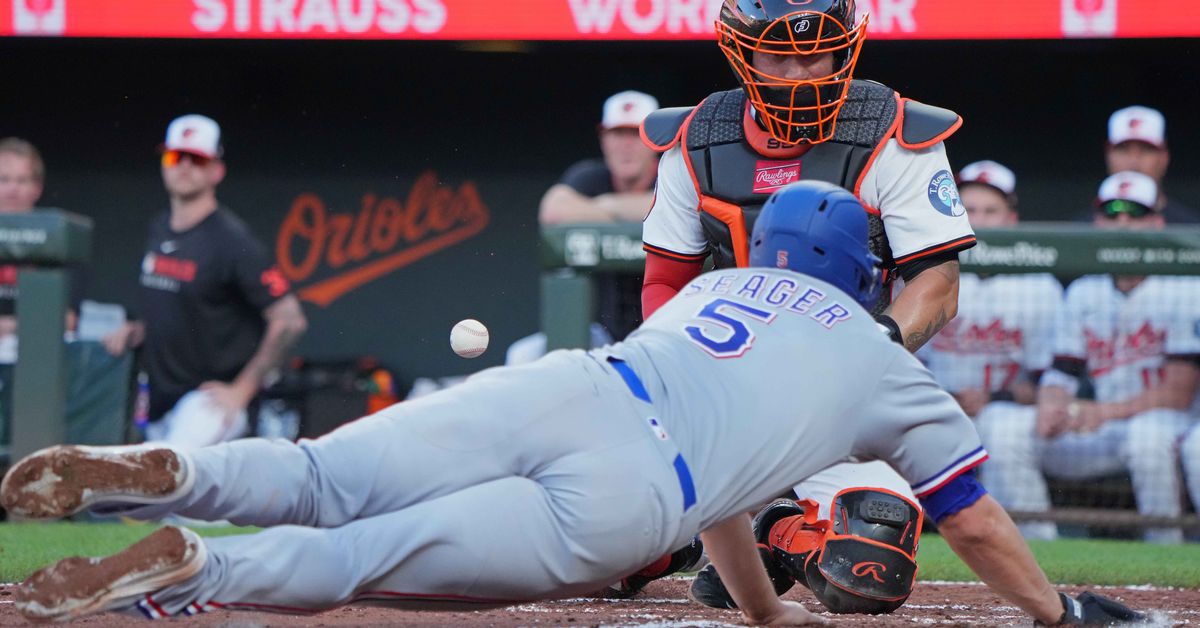 Texas Rangers survive roller coaster to top Baltimore Orioles in extras
