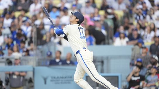 Los Angeles Dodgers two-way player Shohei Ohtani (17) flies out to center during the first inning against against the Washington Nationals at Dodger Stadium.