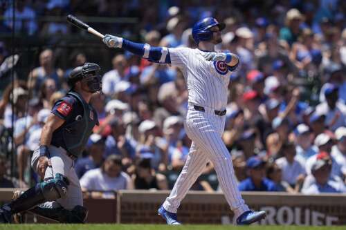 Cubs survive extreme heat by clubbing 5 home runs