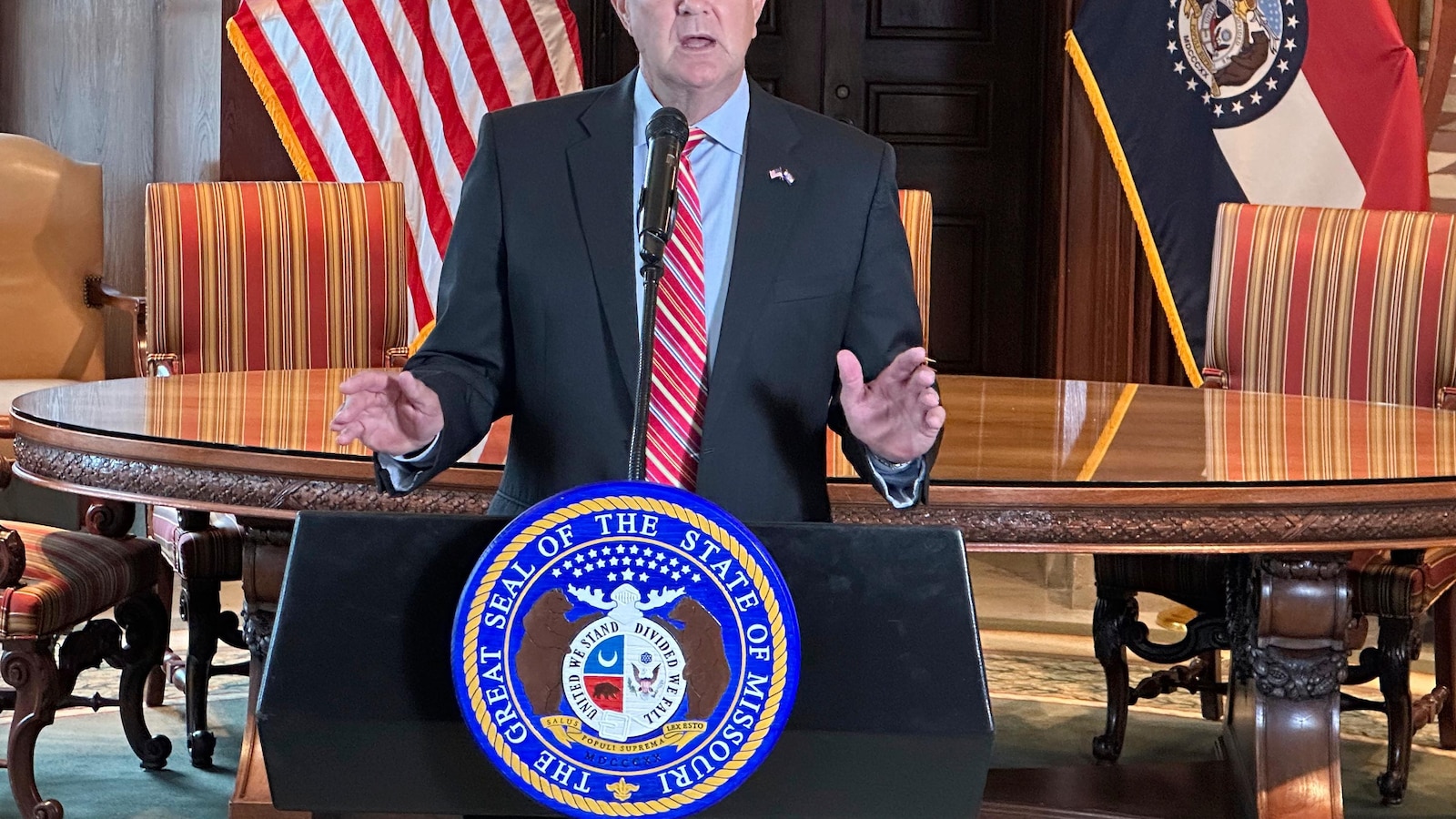 Missouri governor signs stadium aid package intended to keep the Chiefs and Royals in the state