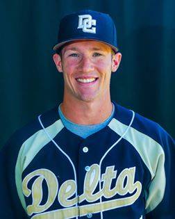 Headshot of a smiling baseball player in a Delta College uniform.