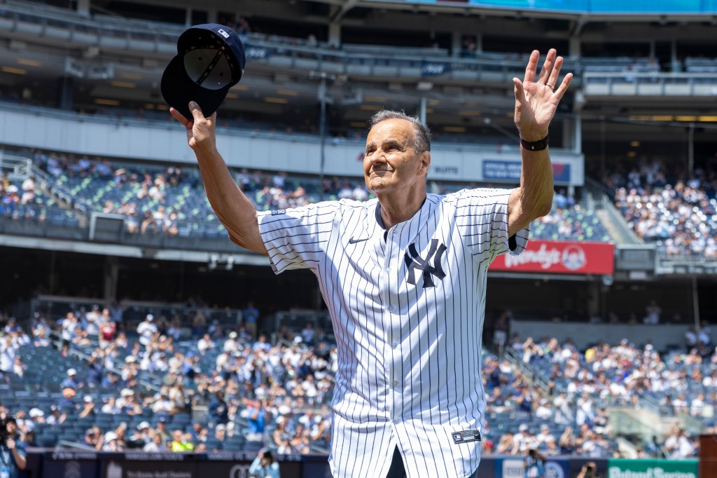 Joe Torre waves to the Yankee Stadium crowd during the 2024 Old Tiimers' Day.