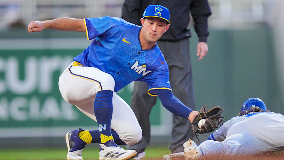 Brooks Lee makes the tag