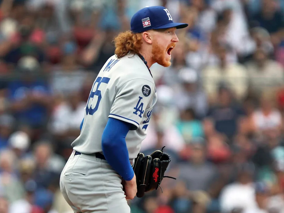 Dodgers starting pitcher Dustin May reacts after retiring the final Boston batter of the fourth inning Sunday.