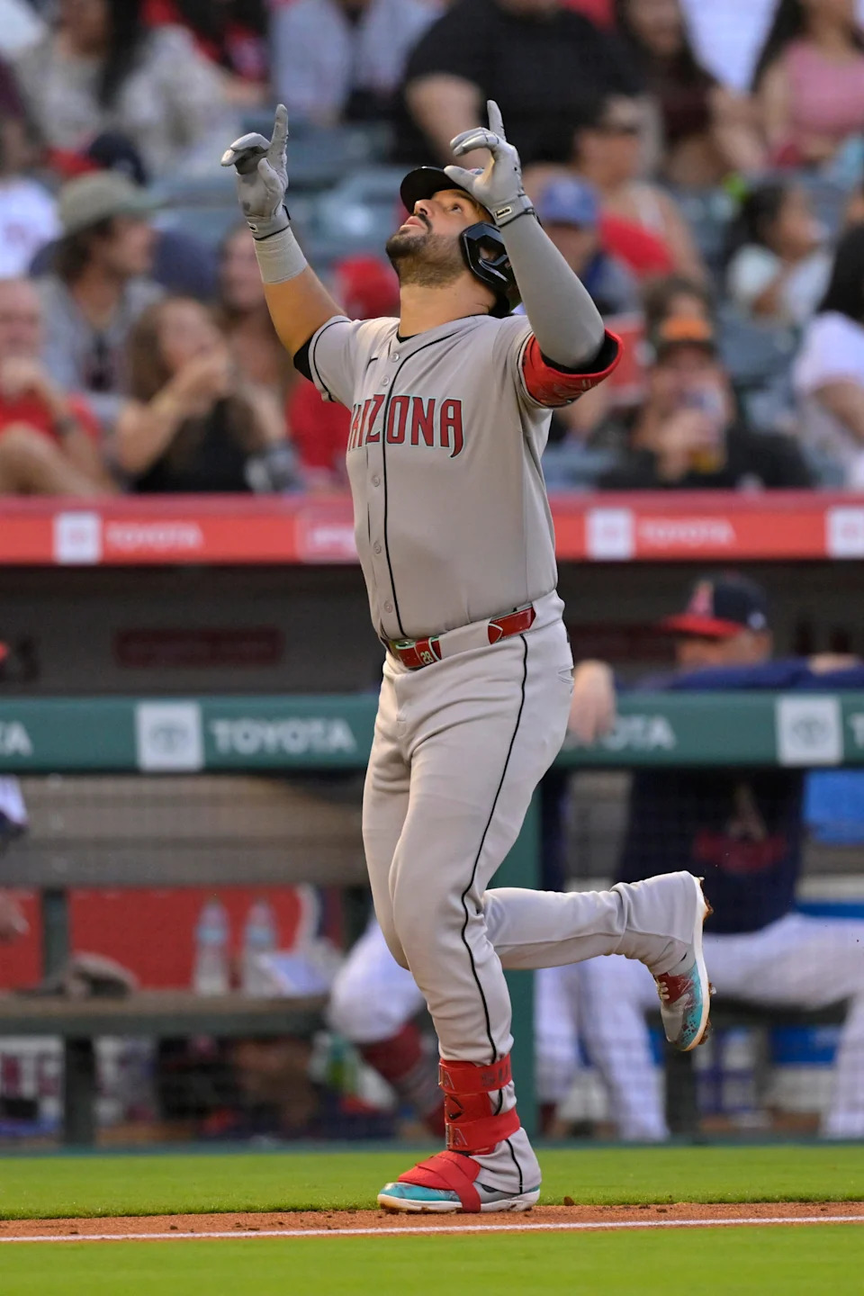 Jul 12, 2025; Anaheim, California, USA; Arizona Diamondbacks third baseman Eugenio Suarez (28) celebrates after hitting his second solo home run of the game during the fourth inning against the Los Angeles Angels at Angel Stadium. Mandatory Credit: Jayne Kamin-Oncea-Imagn Images