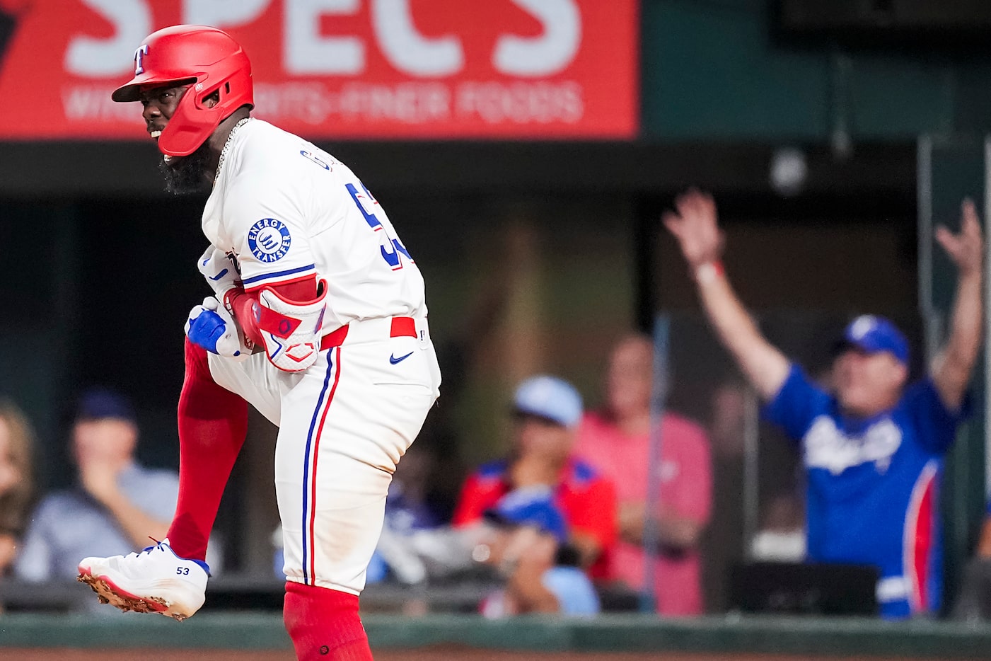Texas Rangers outfielder Adolis García celebrates after hitting a three-run home run during...