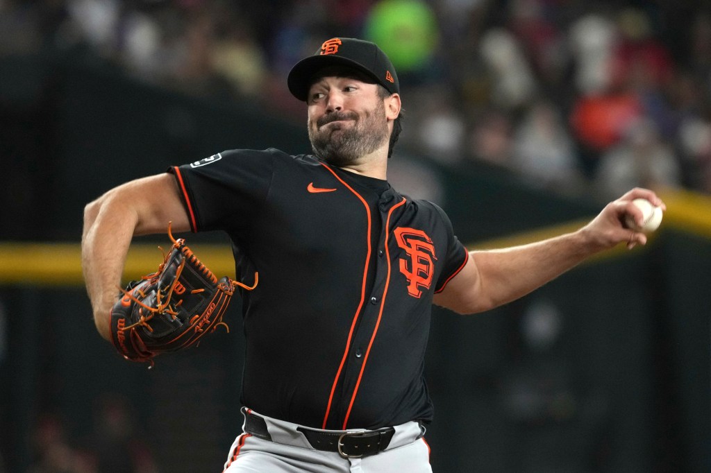 Ray throws second career complete game as SF Giants split series