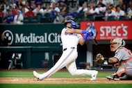 Texas Rangers batter Ezequiel Duran (20) strikes out to end the second inning against the...