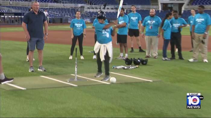 Jeff and Griffin Conine join visually impaired youth for Beep Ball Classic at loanDepot park