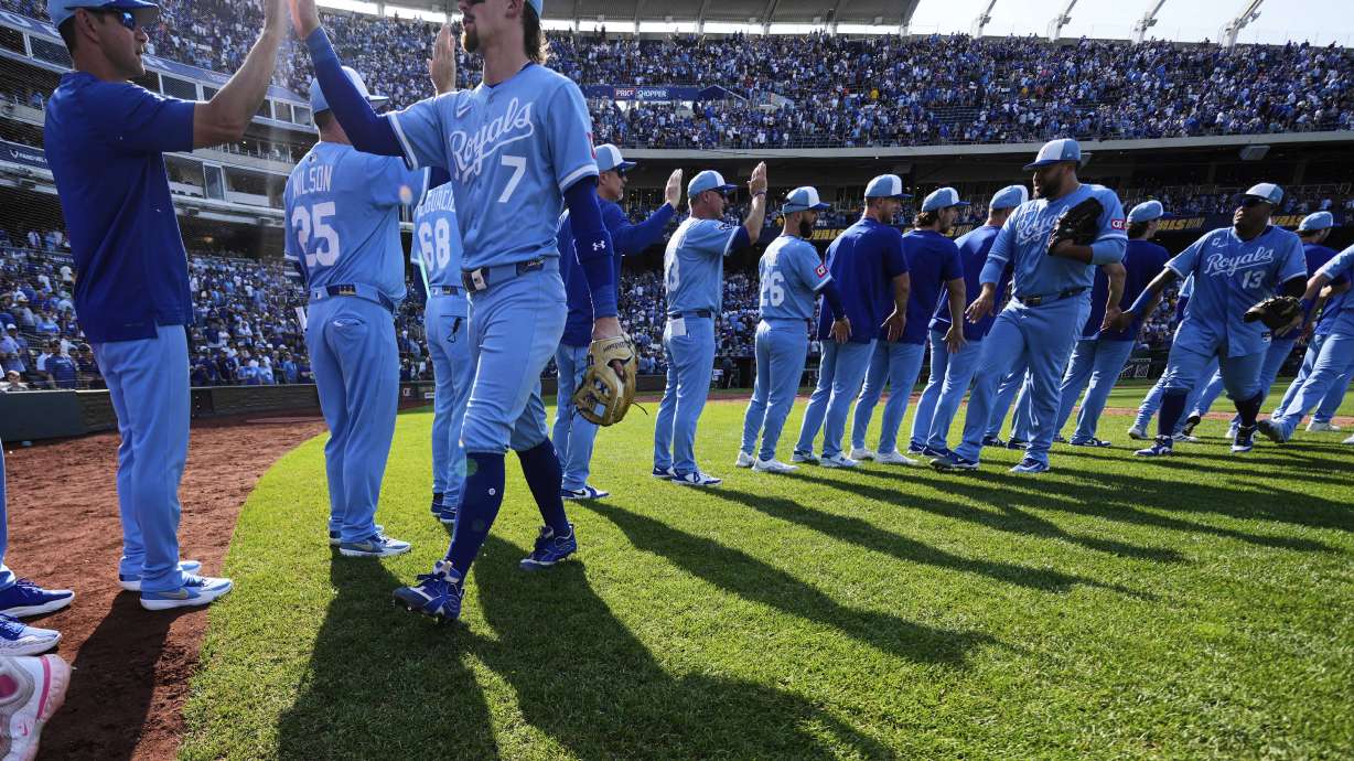 Missouri governor signs stadium aid package intended to keep the Chiefs and Royals in the state