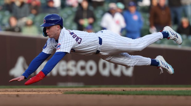 Chicago Cubs outfielder Pete Crow-Armstrong steals second base in the...