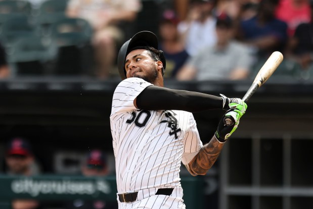 Chicago White Sox second base Lenyn Sosa (50) swings and misses in the tenth inning against the Cleveland Guardians at Rate Field on Sunday, July 13, 2025. (Eileen T. Meslar/Chicago Tribune)