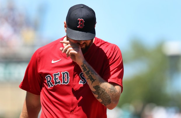 Red Sox starter Lucas Giolito walks to the dugout after a rough first inning against the Cubs on July 18, 2025, at Wrigley Field. (Chris Sweda/Chicago Tribune)