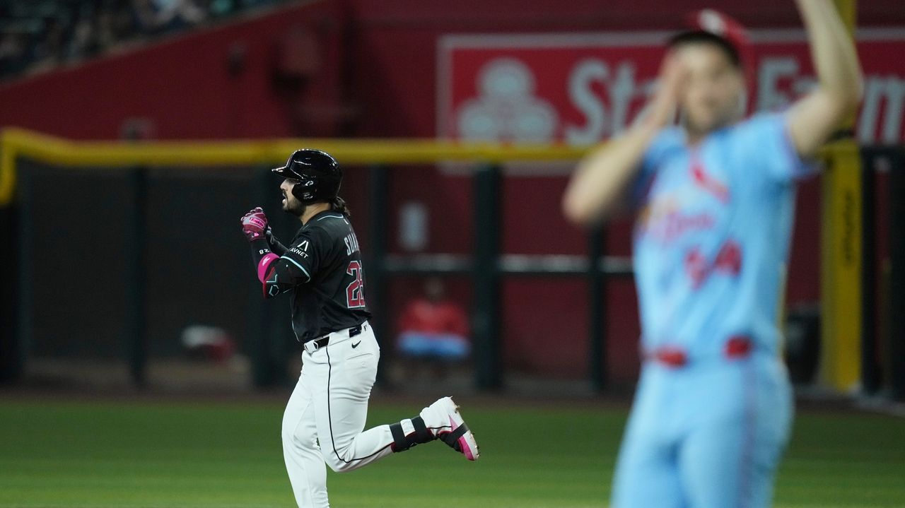 Suarez hits 32nd and 33rd homers as Diamondbacks rout Cardinals 10-1