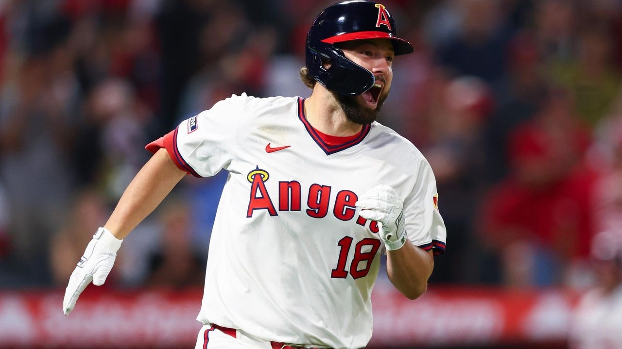 Angels first baseman Schanuel hit by pitch, leaves game and diagnosed with a left wrist contusion