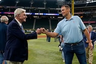 Ray Davis, left, Managing Partner & Majority Owner of the Texas Rangers, and Chris Young,...