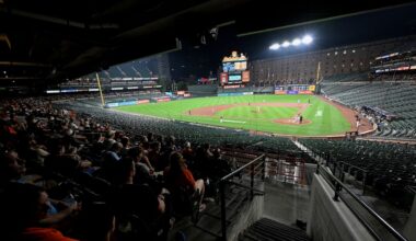 Why did the Orioles and Rockies keep playing after fans evacuated seats?