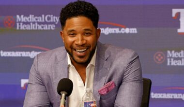 Texas Rangers legend Elvis Andrus runs in the dot race at Globe Life Field