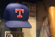 A hat worn by Texas Rangers pitcher Nolan Ryan is displayed at the Baseball Hall of Fame in...