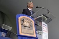 Baseball Hall of Fame inductee Ichiro Suzuki speaks at the National Baseball Hall of Fame induction ceremony in Cooperstown, N.Y., July 27, 2025. (AP Photo/Seth Wenig)