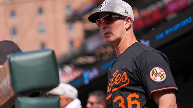 Baltimore Orioles interim manager Tony Mansolino looks on from the dugout during the eighth inning of a baseball game against the Washington Nationals Sunday, May 18, 2025, in Baltimore. (AP Photo/Julio Cortez)