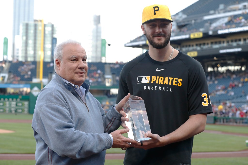 Pittsburgh Pirates pitcher Paul Skenes receiving an award.