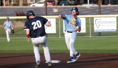 Brookings second baseman Colin Gibson turns a double play during a 9-5 loss to Harrisburg on Tuesday night at Bob Shelden Field in Brookings.