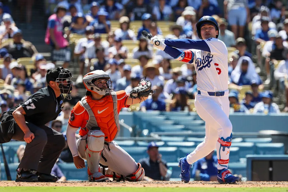 Dodgers second baseman Hyeseong Kim strikes out in the seventh inning against the Houston Astros at Dodger Stadium.
