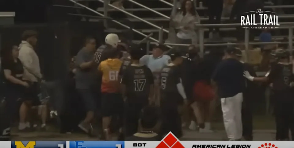 Those in the area separate the fan in red and Eliezer Rosario after punches were thrown. @MyMilfordTV/YouTube