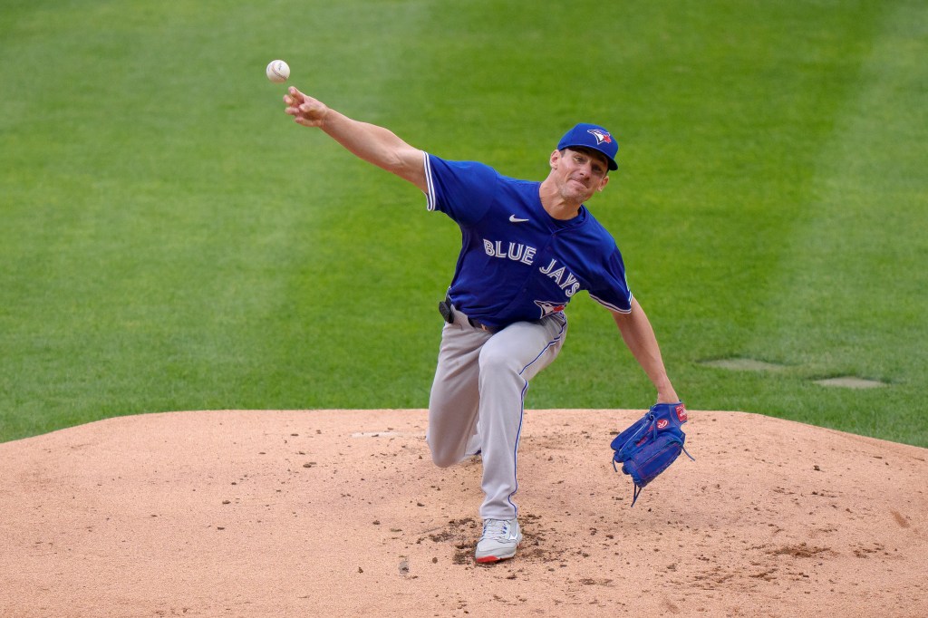 Toronto Blue Jays pitcher throwing a baseball.