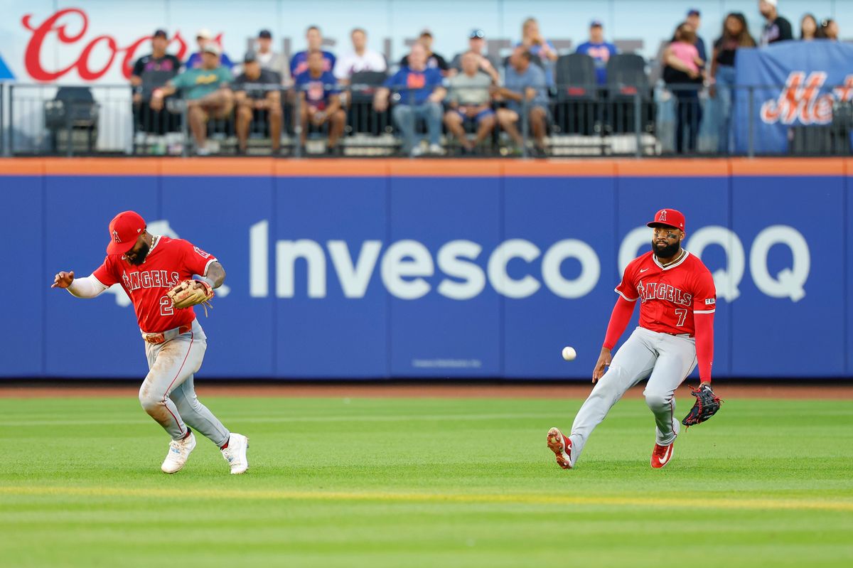Jo Adell #7 of the Los Angeles Angels drops a fly ball against the New York Mets at Citi Field on July 22, 2025 in Flushing, NY. Jo Adell #7 of the Los Angeles Angels drops a fly ball against the New York Mets at Citi Field on July 22, 2025 in Flushing, NY.