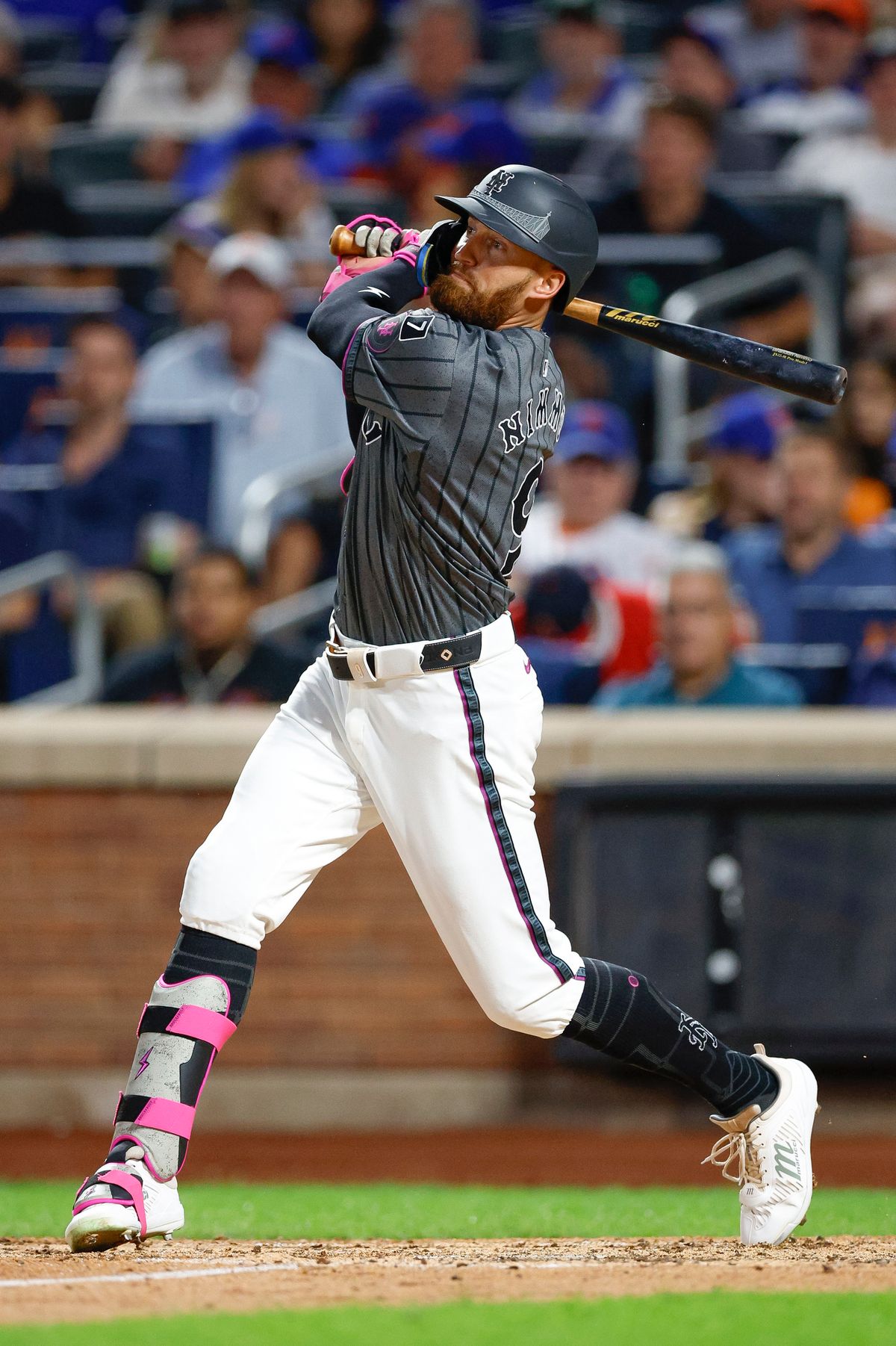 Brandon Nimmo #9 of the New York Mets hits an RBI single against the Los Angeles Angels at Citi Field on July 22, 2025 in Flushing, NY. Brandon Nimmo #9 of the New York Mets hits an RBI single against the Los Angeles Angels at Citi Field on July 22, 2025 in Flushing, NY.