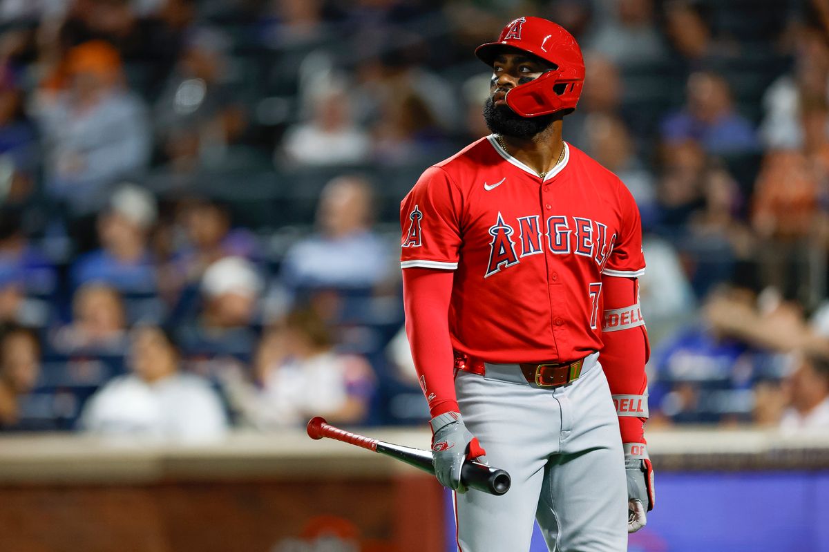 Jo Adell #7 of the Los Angeles Angels heads to the dugout after striking out against the New York Mets at Citi Field on July 22, 2025 in Flushing, NY. Jo Adell #7 of the Los Angeles Angels heads to the dugout after striking out against the New York Mets at Citi Field on July 22, 2025 in Flushing, NY.