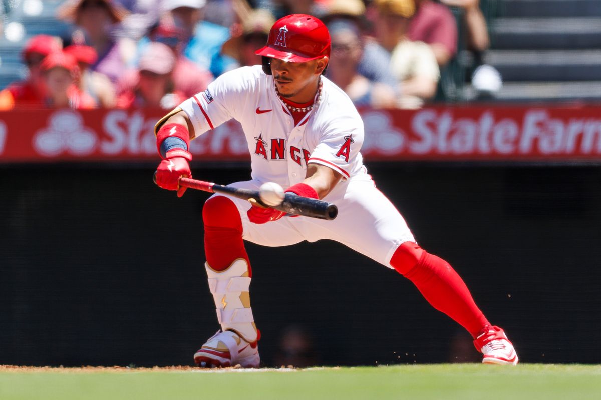 Ryan Zeferjahn #56 of the Los Angeles Angels attempts to bunt during the game against the Seattle Mariners at Angel Stadium of Anaheim on July 27, 2025 in Anaheim, California. 