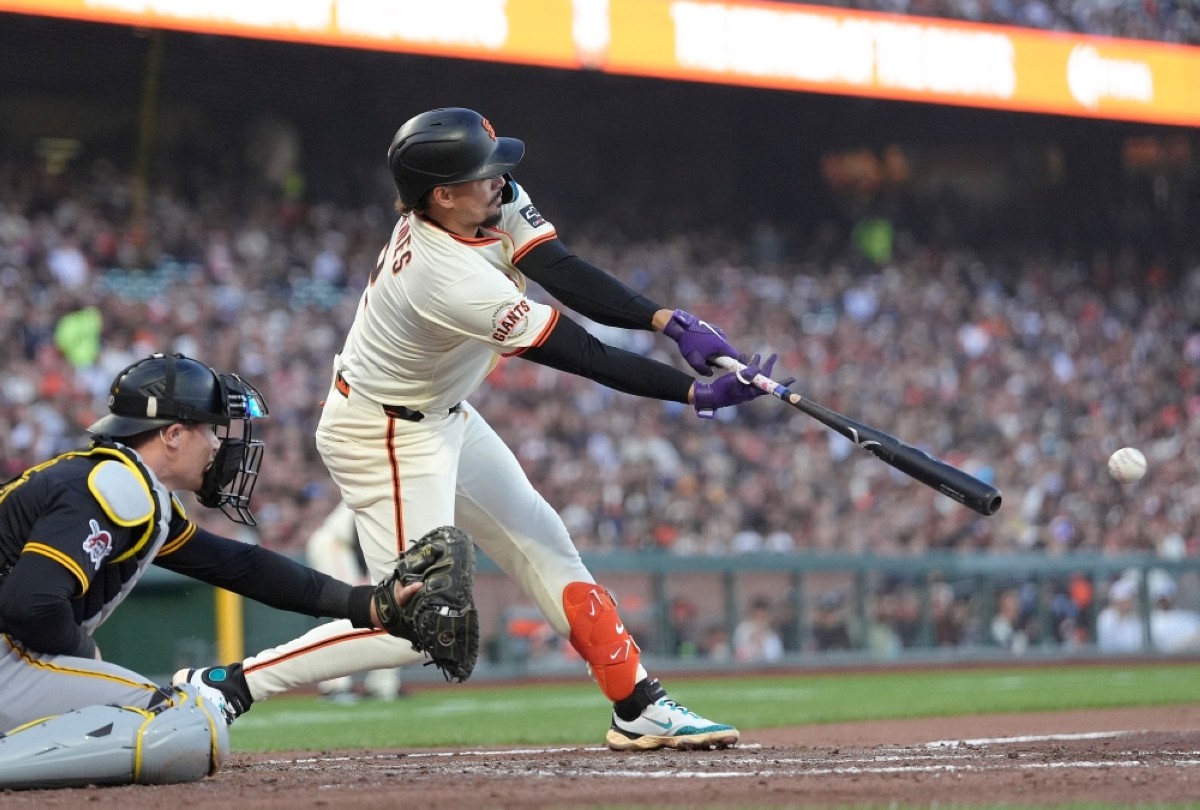 SAN FRANCISCO:  Willy Adames #2 of the San Francisco Giants hits a bases loaded RBI single scoring Patrick Bailey #14 against the Pittsburgh Pirates in the bottom of the second inning at Oracle Park in San Francisco, California. – AFP