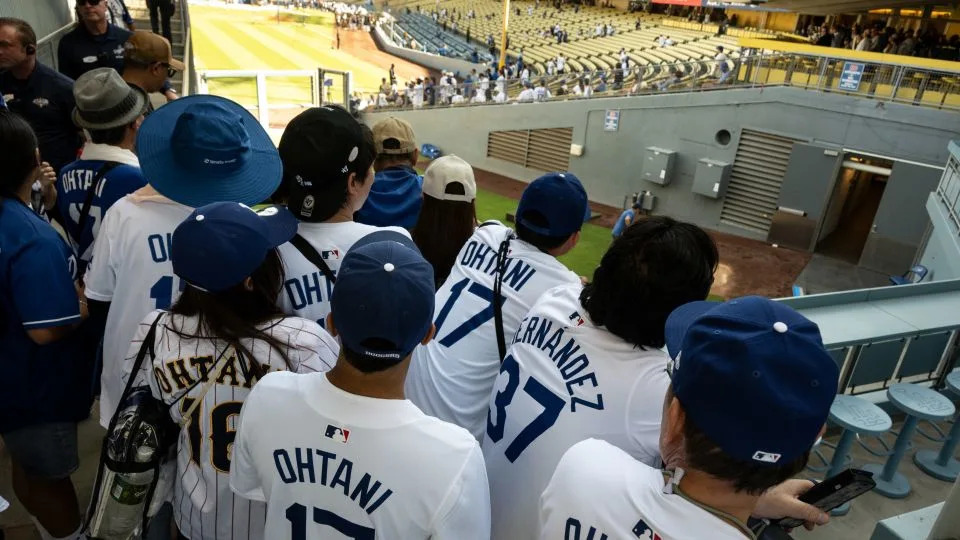 Los Angeles, CA - June 16:Dodger fans crowd around the Dodger bullpen hoping for a glimpse of Shohei Ohtani before the start of the game against the Padres at Dodger Stadium on Monday, June 16, 2025. Ohtani is scheduled to make his pitching debut as a Dodger on Monday. (Photo by David Crane/MediaNews Group/Los Angeles Daily News via Getty Images) - David Crane/MediaNews Group/Los Angeles Daily News/Getty Images