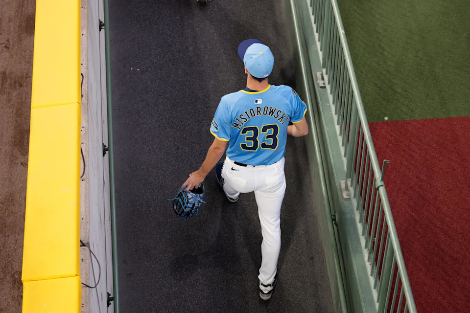 Jun 12, 2025; Milwaukee, Wisconsin, USA; Milwaukee Brewers pitcher Jacob Misiorowski (33) walks into the bullpen during warmups prior to the game against the St. Louis Cardinals at American Family Field. Mandatory Credit: Jeff Hanisch-Imagn Images