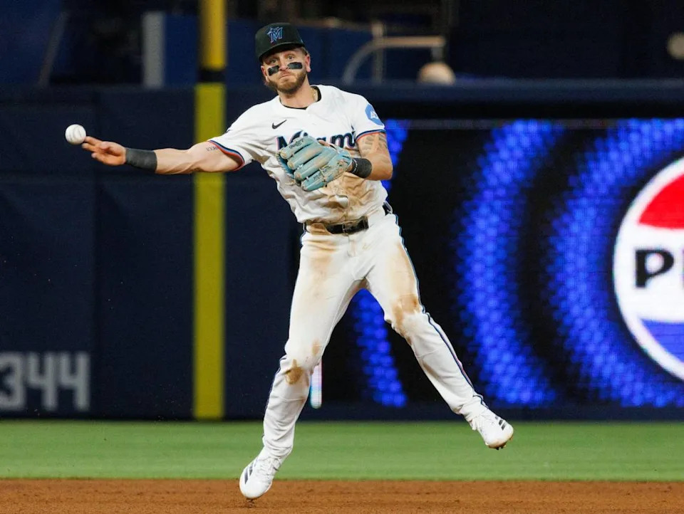 Miami Marlins third baseman Connor Norby (1) throws the ball to first baseman Liam Hicks (34) during the sixth inning of a game against the Minnesota Twins on Tuesday, July 1, 2025 at loanDepot Park in Miami, Fla.