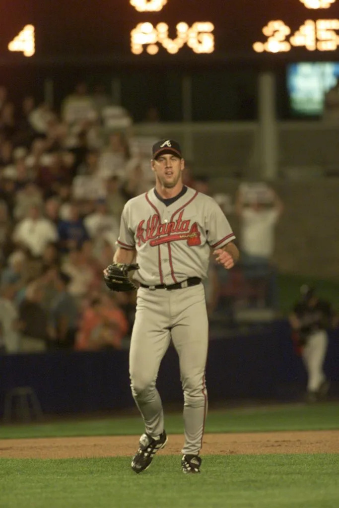 Braves relief pitcher John Rocker runs into the game from the outfield in the eighth inning. New York Post/Charles Wenzelberg