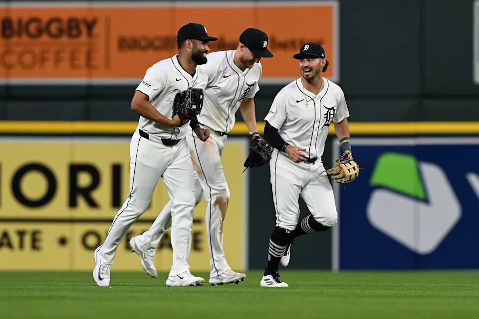 Detroit Tigers outfielders, from left: Riley Greene, Parker Meadows and Zach McKinstry celebrate their win over the Tampa Bay Rays at Comerica Park in Detroit on Monday, July 7, 2025.